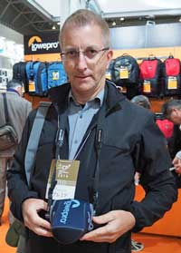 Mark Allister, Ted’s Cameras, with one of the new neoprene camera cases on display on the Lowepro stand. 